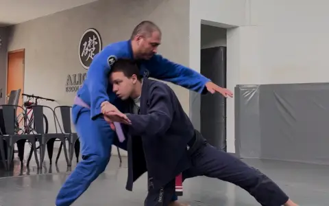 Ouchi Makikomi com uma Esgrima